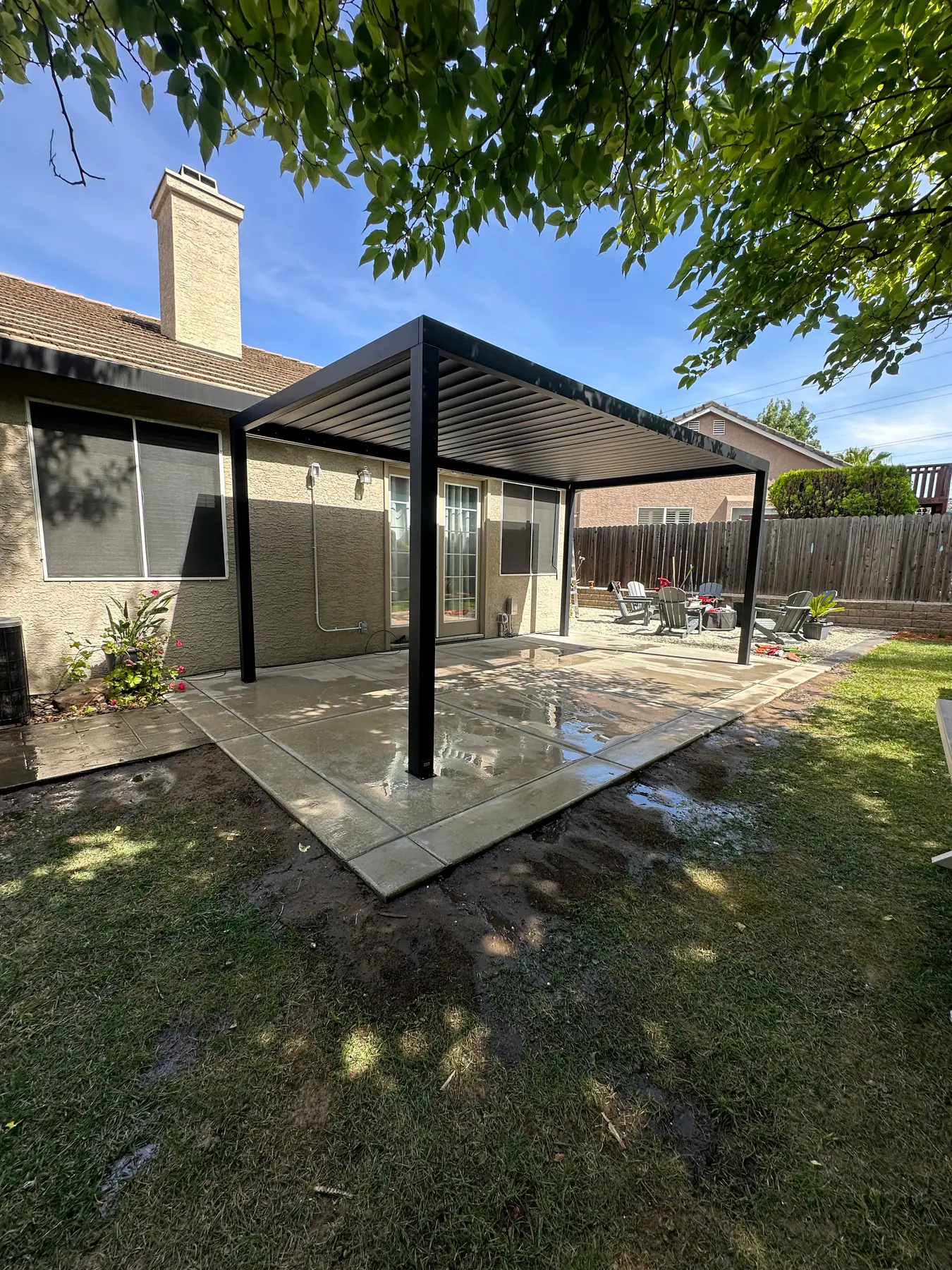 David and Lisa Park, Vermex clients from Roseville, enjoying their new outdoor kitchen and BBQ area